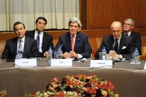 Secretary of State John Kerry with other diplomats in Geneva on Nov. 22. Photo courtesy of the U.S. Department of State 