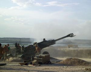 Canadian soldiers firing artillery in Afghanistan, Courtesy Creative Commons 
