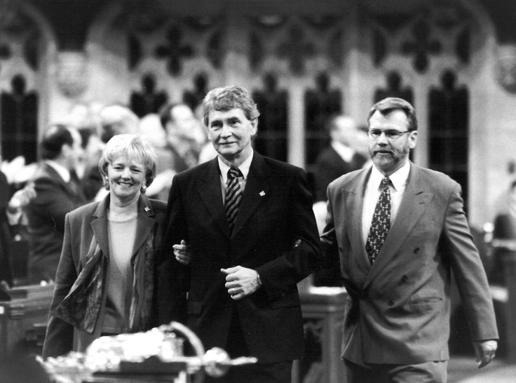 NDP leader Alexa McDonough and MP Richard Proctor escort Dennis Gruending into the House of Commons, 1999