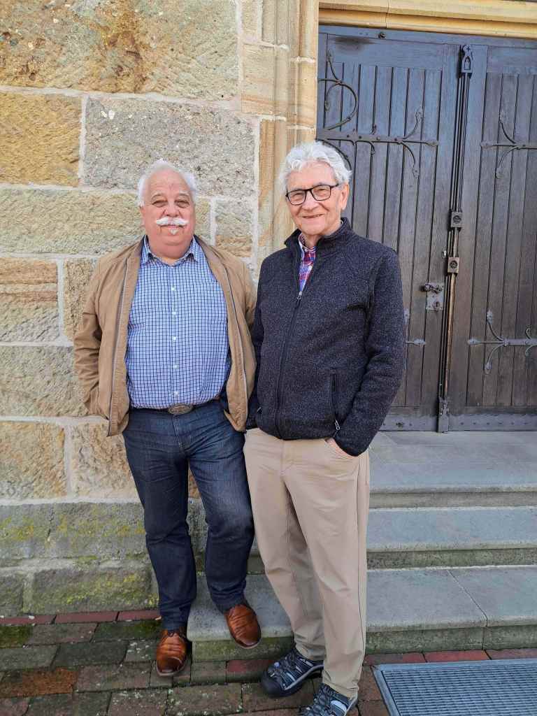 Franz-Josef Tegenkamp (left) and Dennis Gruending at a church in Neuenkirchen, Germany.